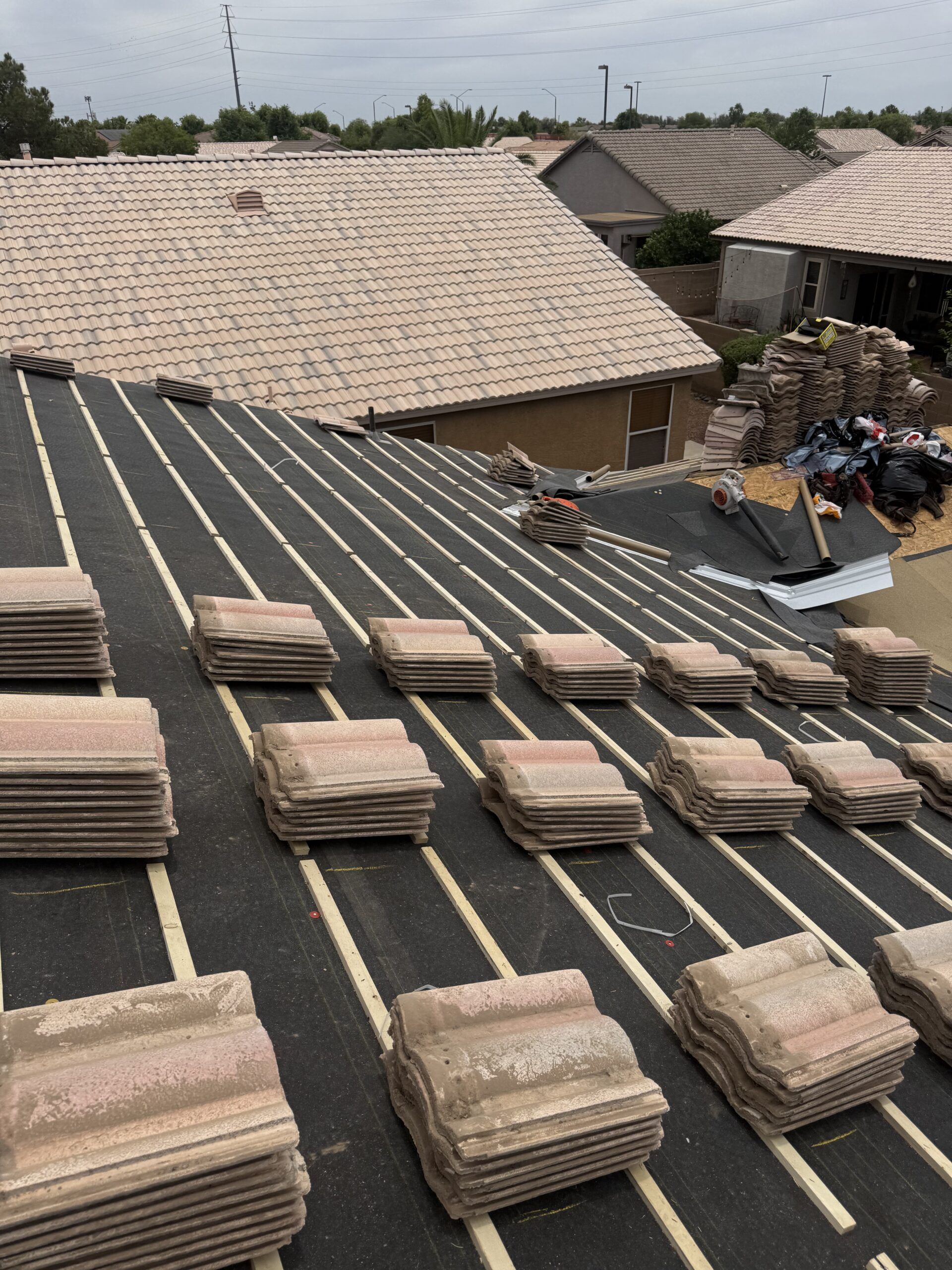 Gilbert tile roof with new underlayment and battens installed before tile reset