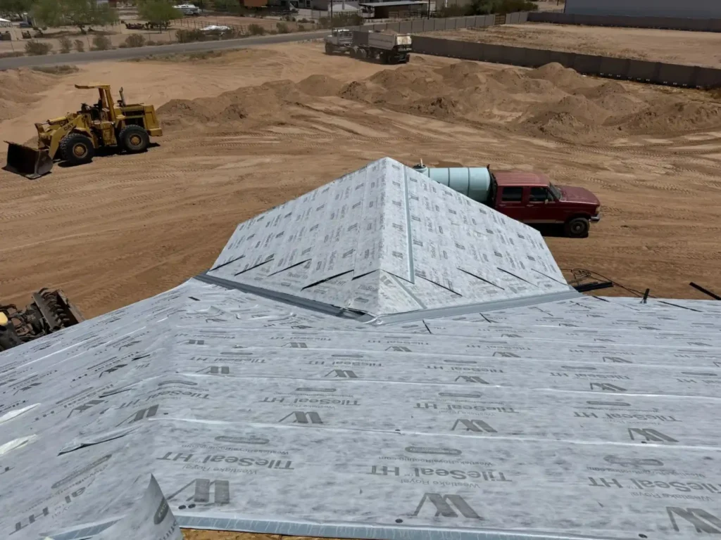 Roof deck covered with self-adhered TileSeal underlayment during a tile roof underlayment replacement
